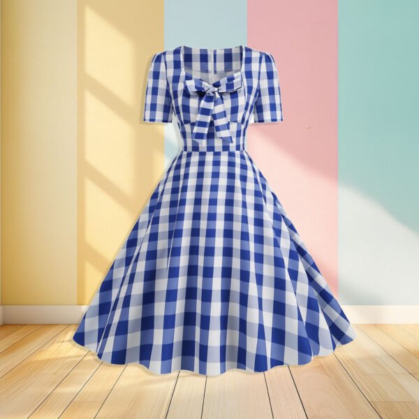 blue check dress front view, pastel colored wall in the background