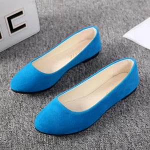 blue flats standing on a grey carpet