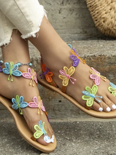 woman wearing butterfly sandals