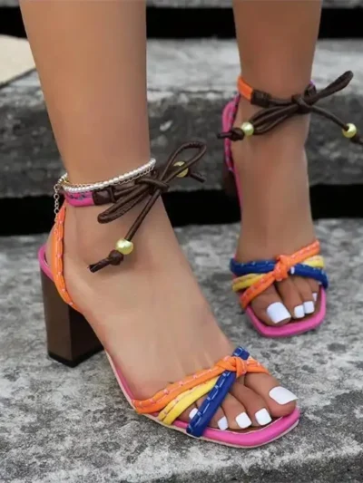 woman wearing color block sandals