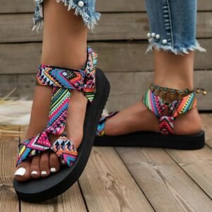 woman wearing colorful flat sandals