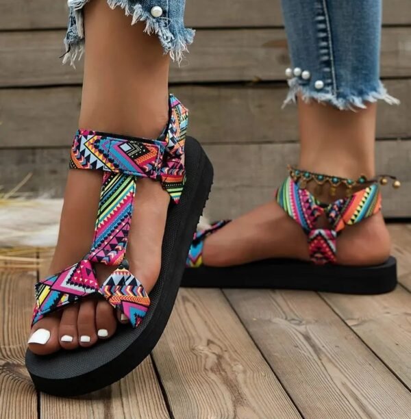 woman wearing colorful flat sandals