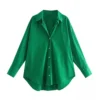 dark green blouse front view hanging in the air, white background