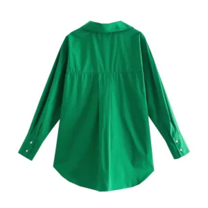 dark green blouse back view hanging in the air, white background