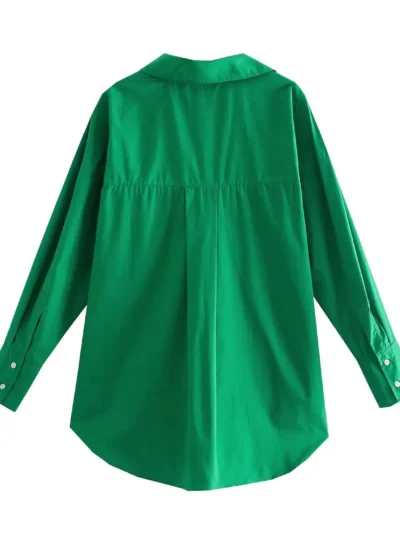 dark green blouse back view hanging in the air, white background