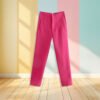 hot pink pants front view, pastel colored wall in the background