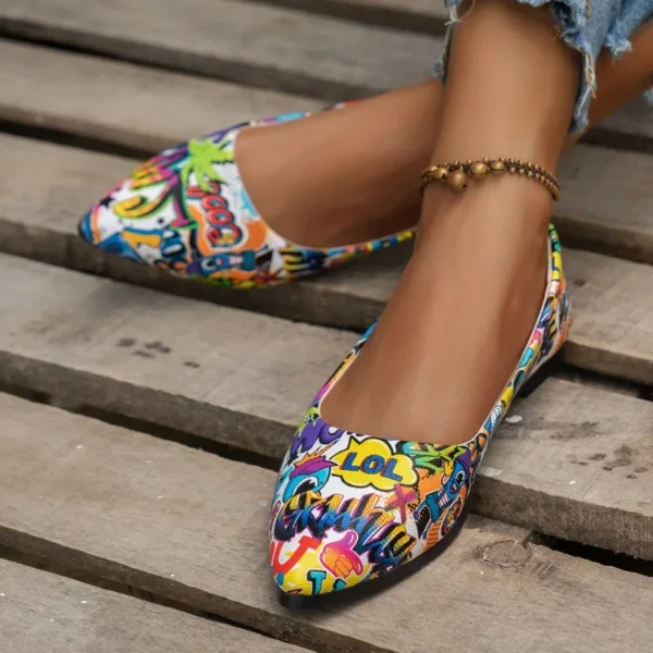 multicolor flats front view on feet, wooden floor under them