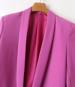 the upper part of the pink blazer