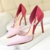 pink color heels on the white box