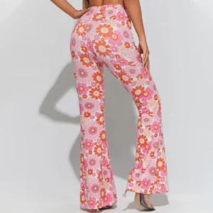 woman turned to her back wearing pink floral pants