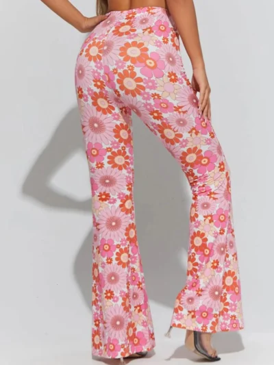 woman turned to her back wearing pink floral pants