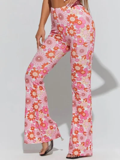 woman wearing pink floral pants on the white background