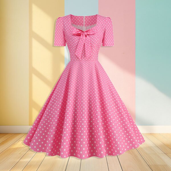 pink polka dot dress front view, pastel wall in the background