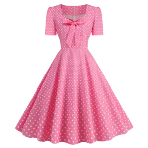 pink polka dot dress on the white background