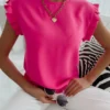 woman wearing pink short sleeved shirt