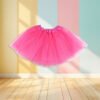 pink tulle skirt front view, pastel colored walls in the background