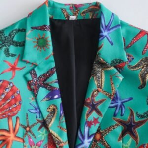 the collar of the turquoise blazer