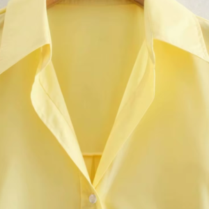 the collar of yellow blouse