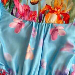 the fabric of the blue floral dress