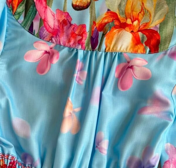 the fabric of the blue floral dress