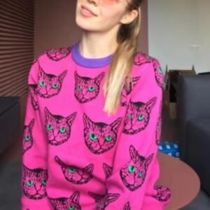 girl wearing cat sweater