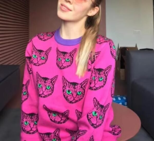 girl wearing cat sweater