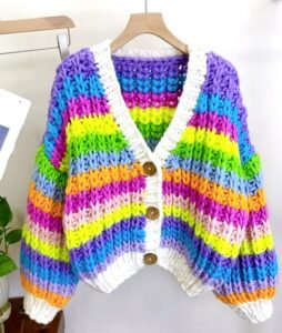 Colorful Cardigan collection front view featuring vibrant multicolor cardigan hanging on a hanger