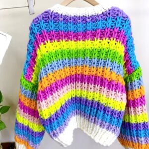 back side of the colorful knit cardigan hanging on a hanger