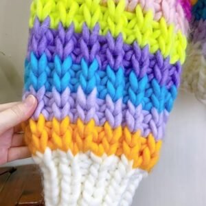 the sleeve of colorful knit cardigan