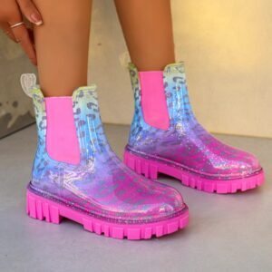 woman wearing colorful rain boots