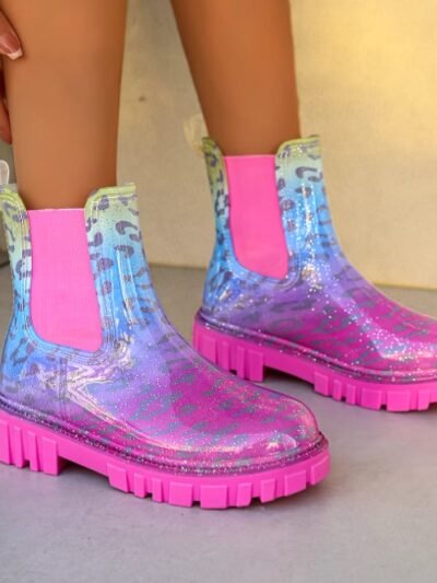 woman wearing colorful rain boots