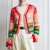 woman wearing colorful striped cardigan