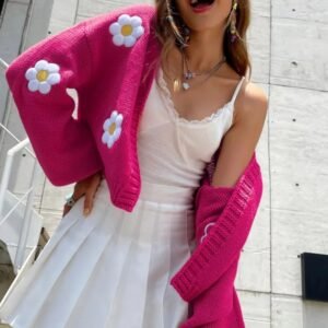 woman wearing floral cardigan and a white dress