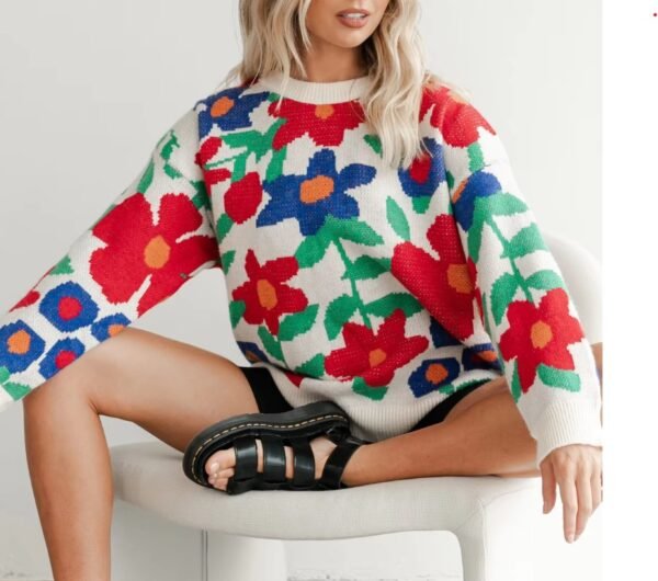 woman wearing floral sweater