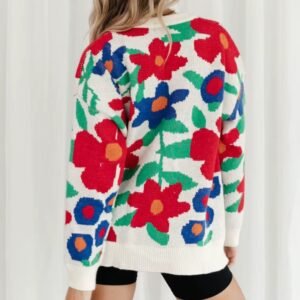 woman turned to her back wearing the floral sweater