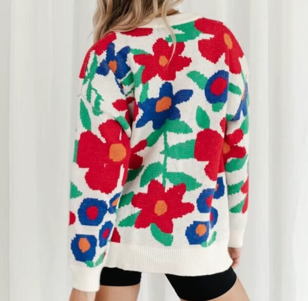 woman turned to her back wearing the floral sweater