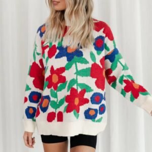 woman with blonder hair wearing the floral sweater