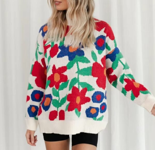 woman with blonder hair wearing the floral sweater