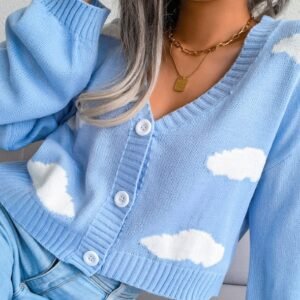 the fabric and the buttons of light blue cardigan