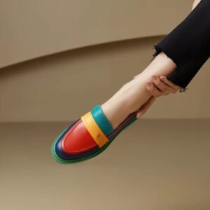 multicolor loafers on feet