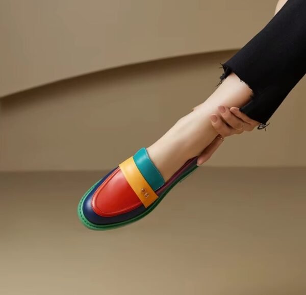 multicolor loafers on feet