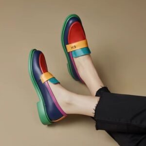 multicolor loafers on feet