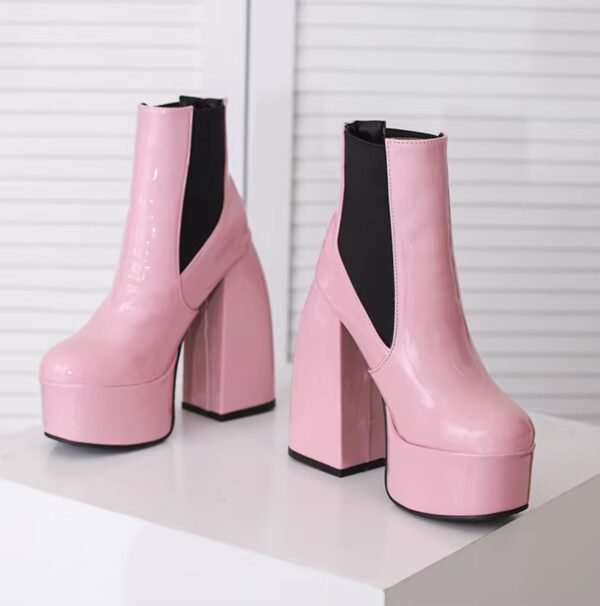 pale pink boots front view standing on a white box