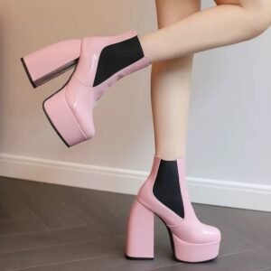 pale pink boots on feet side view, wooden floor under them