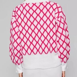 woman turned to her back wearing pink and white sweater