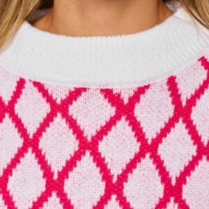 the collar of pink and white sweater