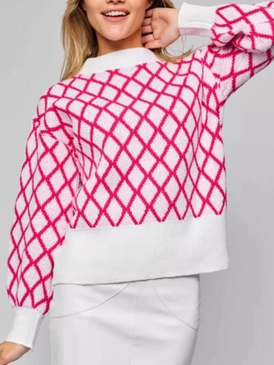 woman wearing pink and white sweater and white skirt