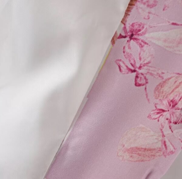 the inside and outside fabric of the pink floral blazer