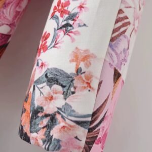 the sleeve of the pink floral blazer