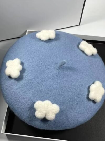 cloudy colorful beret lying in the black box